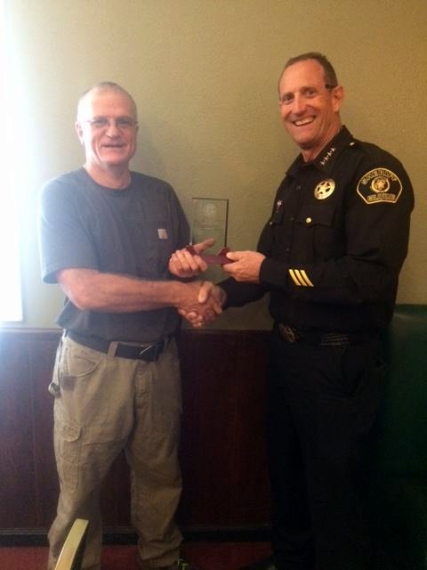 Sheriff Rick Dibasilio Congratulates Sergeant John Black On His Retirement