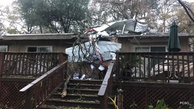 Plane Crashes on Auburn Home, Pilot Survives & Residents Uninjured